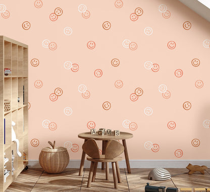 Play corner under a sloped ceiling with Smiley Confetti wallpaper in pink
